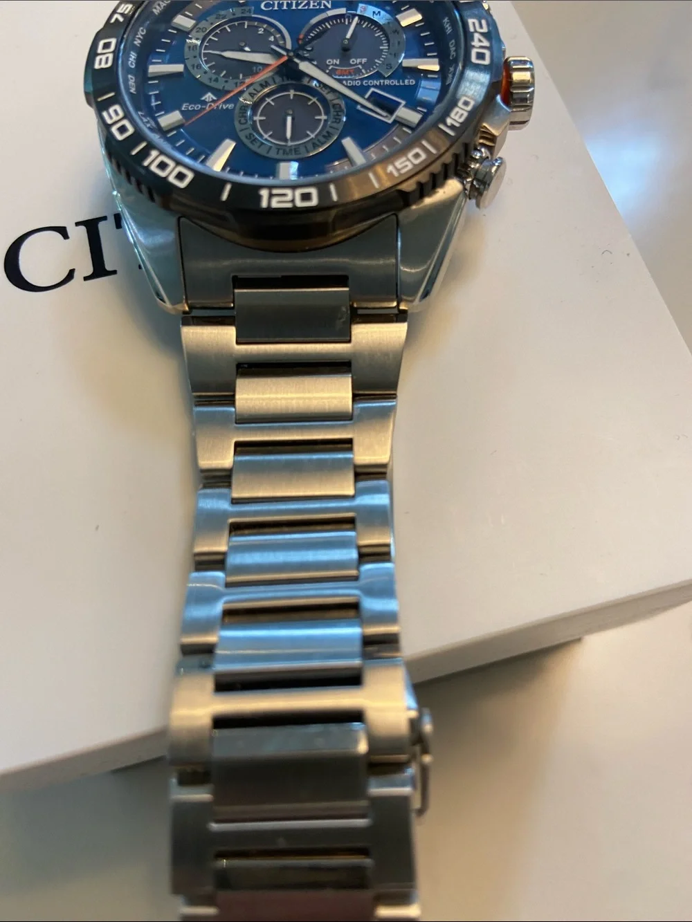 Citizen Eco-Drive Stainless Watch with Blue Dial and Silver Bracelet.. sapphire